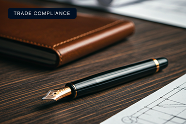 Pen and business documents for trade compliance